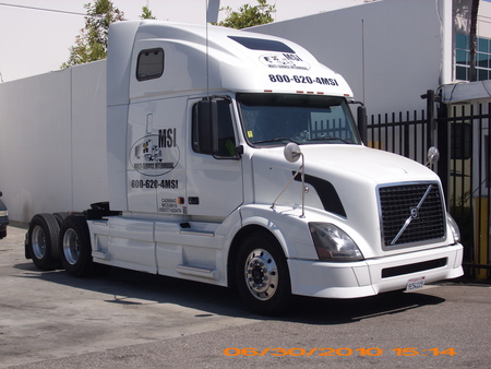 VERY NICE TRUCK - semi, hard, bigrig, hot, road, 18 wheeler, outside, truck, big, white, trucking, sunnyday, volvo