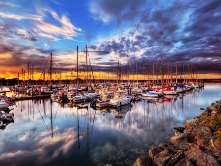 Sailboats - beauty, sky, harbour, sailboats, peaceful, colorful, sunset, rocks, port, view, reflection, clouds, marina, boat, ocean, boats, sailing, lovely, nature, pier, beautiful, sailboat, colors, sunrise, sea