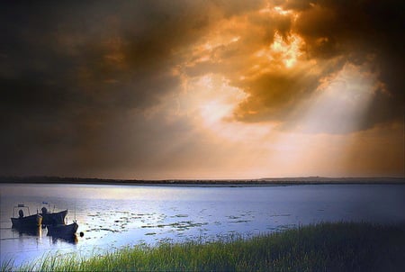 When the storm is over - storm clouds, ocean, boats, shore, rays of sun