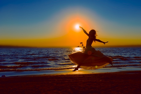 Dancing with the sun - beautiful girl, beach, girl, sea, beauty, love, light, sand, sunset, waves, dance, sun