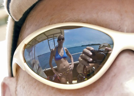 Do you see what I see - photographer, woman, bikini, man, reflection