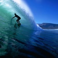 Surfing-the-tube-at-Dunes-Noordhoek-Beach-Cape-Town