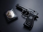 gun and badge