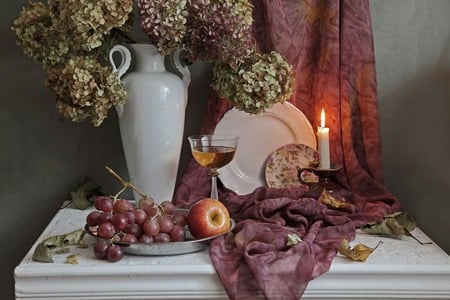 by candle light - candle, wine, still life, vase, cloth, table, flowers, grapes, apple, plate