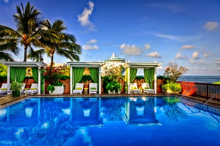 Just Relax - swimming pool, colorful, chairs, modern, view, reflection, romance, sunny, grass, swimming, nature, chair, romantic, beautiful, sea, beauty, sky, peaceful, water, hotel, pretty, clouds, green, architecture, resort, relax, ocean, palms, summer, lovely, luxury, blue, flowers, colors, pool