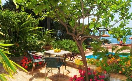 Lovely View - swimming pool, terrace, colorful, chairs, modern, umbrellas, view, umbrella, table, holiday, romance, sunny, garden, swimming, sicily, nature, chair, romantic, beautiful, leaves, lemons, sea, beauty, trees, italy, peaceful, pretty, architecture, resort, relax, sicilia, summer, lovely, italia, luxury, flowers, colors, pool