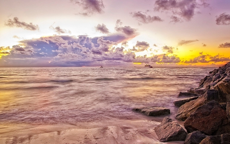 Sunrise - yellow, summer, beach, boat, splendor, sunrise, pink, sailboats, sand, dream, sailing, view, impossible, sky, clouds, image, beautiful, sea, beauty, colors, lovely, ocean, boats, colorful, nature, sunset, sailboat, waves, peaceful, rocks