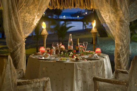 Romantic dinner - pretty, calm, beach, boat, food, romance, night, sand, torches, flowers, dinner, fire, candles, nice, beautiful, photography, sea, table, lovely, cool, love, ocean, drink, harmony, champagne, peaceful