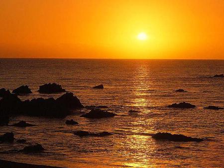 Amazing Sunset - reflect, sunset, water, amazing, over, sea, rocks, sun