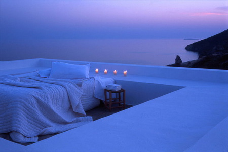 The best place for dream - dream, over the sea, space, corner, best, bed, pink sky, candles, place