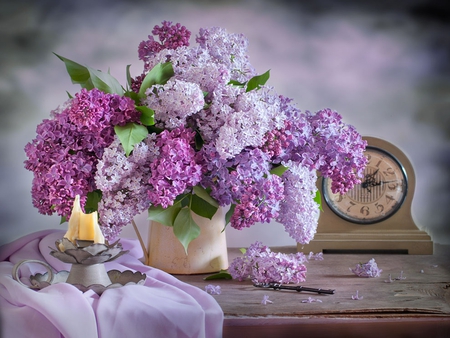 Still Life - beauty, photography, candles, colorful, still life, spring, with love, petal, purple, pretty, arrangement, petals, table, clock, romance, lilac, candle, key, for you, lovely, vase, nature, lilacs, romantic, beautiful, colors, flowers, flower