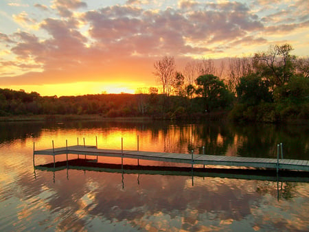 The end... - end, amazing, landscape, reflection, lake, golden, sky, sun, clouds, trees, water, image, beautiful, beauty, gold, dock, glow, glowing, nature, sunset, background, day