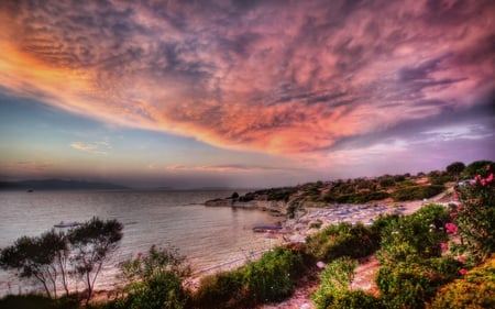 Sunrise - pretty, summer, sundown, sunrise, sand, flowers, umbrella, nice, small, beauty, colors, stones, pier, village, nature, sunset, green, umbrellas, coast, town, amazing, beach, splendor, grass, shore, purple, view, houses, sky, clouds, trees, beautiful, sea, lovely, ocean, tree, colorful, peaceful, rocks