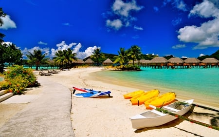 Summer Time - paradise, colorful, chairs, view, yellow, sunny, boat, boats, tropical, nature, chair, beautiful, sea, beauty, sky, beach, trees, peaceful, clouds, architecture, green, tree, house, resort, sand, relax, ocean, houses, palms, summer, lovely, exotic, blue, splendor, island, colors