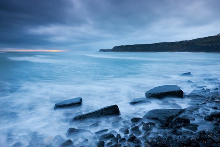 MISTY BLUE - misty, clouds, sunset, blue, cliffs, ocean, stones, sky