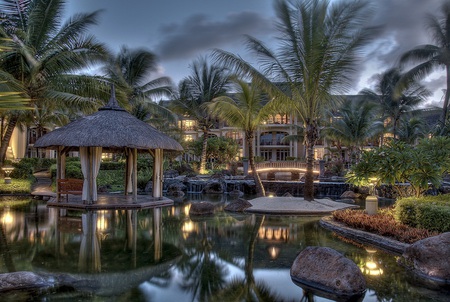 Garden reflections - evening, light, reflection, curtain, garden, bench, palm trees, yard, nice, clouds, house, pond, boulders, courtyard, cabana, bridge, rocks