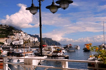 Amalfi terrace.   Italy - sunlight, terrace, near the sea, amalfi, flowers, boats, lights, ships, italy