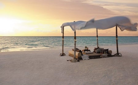 Romance - relax, romantic, wood, windy, beach, evening, pillows, romance, picnic, sunrise, sand, wine, fire, canopy, mattress, throw, bottles, water, beautiful, cushions, ice bucket, lanterns, table, love, ocean, ice, sticks, sunset, waves, rocks