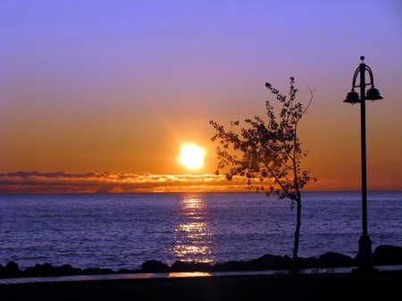 Another day - beach, water, sunset, pathway, blue water, evening, reflection, beautiful, couds, tree, golden, sunrise, lamp post