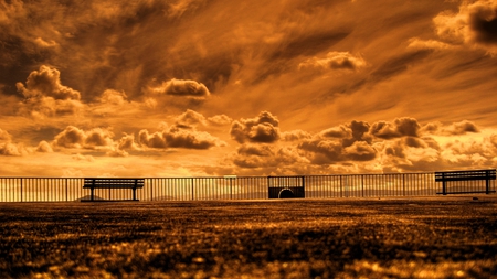 Viewing the Sunset - clouds, sunset, benches, gold, orange