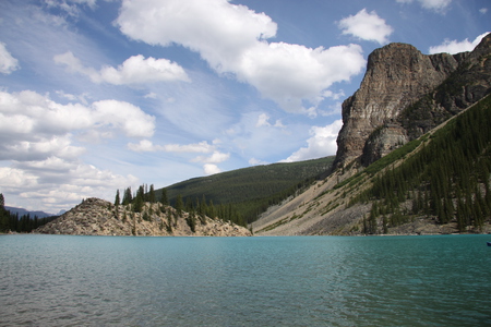 Lake at Banff National Park in Alberta - Canada  - sky, trees, photography, mountains, white, nature, lakes, clouds, blue, green