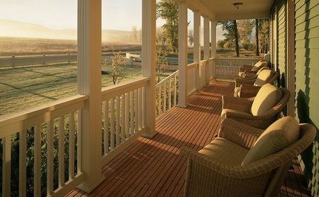 Watching the sunrise - veranda, porch, railing, shadows, chairs, relaxing, cushions, front porch, house, sunrise