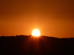 Sunsetting behind mountains