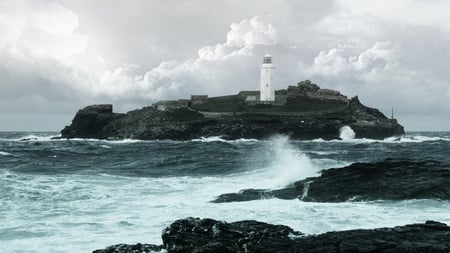 Lighthouse - clouds, water, lighthouse, sea, wet, beauty, ocean, architecture, shore, nature, land, wave, sky, rocks