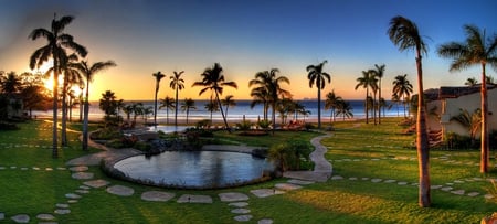 Sunset - pretty, calm, beach, grass, style, nice, houses, sky, sun, luxury, palms, water, beautiful, photography, sea, beauty, resort, lovely, cool, architecture, ocean, harmony, nature, sunset, design, pool, pleasant