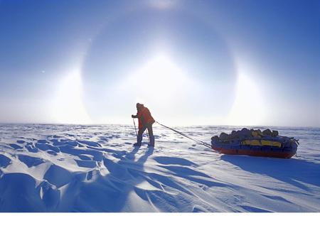 kobalenko_hauling_sundog - winter, nature, photography, man, sun, sundog, sky