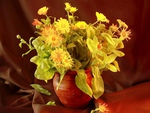 simple flowers in ceramic vase