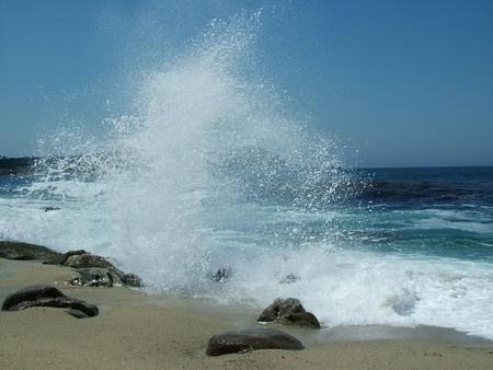 Just a Splash - water, blue, beach, rock, ocean, sand, white, nature, splash, wave, sky