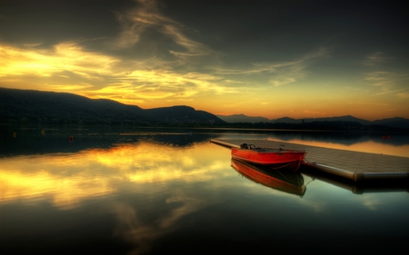 Lovely Sunset - beauty, sky, peaceful, water, colorful, sunset, mountains, view, reflection, clouds, boat, lake, landscape, boats, lovely, nature, pier, beautiful, splendor, colors