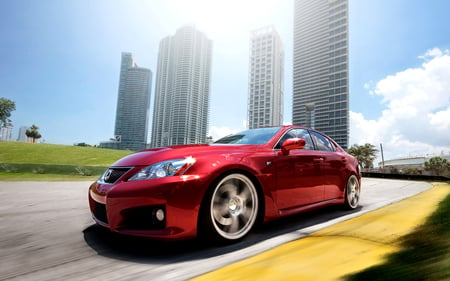 Red Car - pretty, amazing, skycraper, stunning, car, red, nice, sky, way, sun, clouds, palms, beautiful, racing, road, buildings, wonderful, drive, ride, race