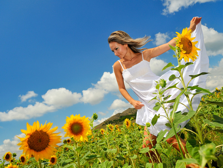 My Anna in the field of happy flowers - lovely woman, anna, sky, sunflowers, gladness, yellow, clouds, green, beautiful girl, sunny day, love, lady, white dress, happy flowers, blue, happiness, friendship, forever sunshine