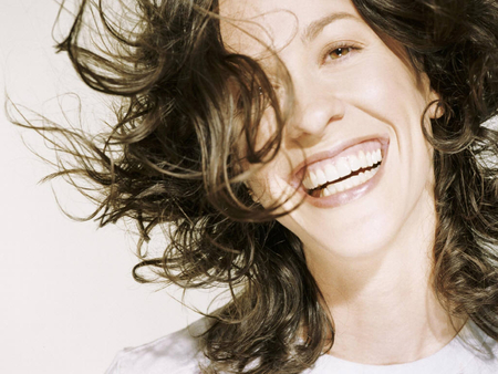 Alanis Morissette - big smile, dark hair, female, pop singer, cute