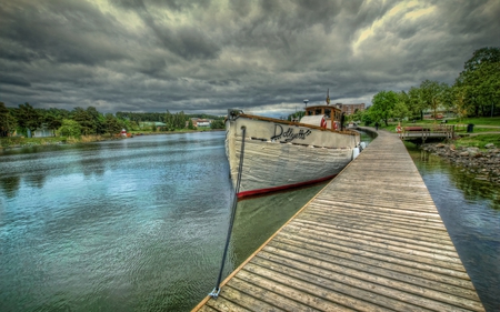 Beautiful View - sailboats, path, sailing, house, road, beauty, colors, architecture, stones, pier, boats, nature, sailboat, green, town, amazing, boat, evening, splendor, grass, reflection, walk, leaves, view, lake, houses, sky, clouds, storm, trees, water, beautiful, stormy, lovely, tree, peaceful