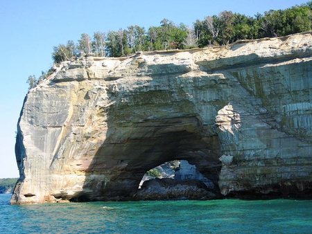 Grand Portal - ocean, caves, trees, coastline, rock formations, water, rocks