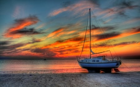 Sunset - beauty, sky, beach, sailboats, peaceful, colorful, sunset, view, pretty, reflection, clouds, sand, boat, ocean, boats, summer, sailing, lovely, nature, beautiful, splendor, sailboat, colors, sea