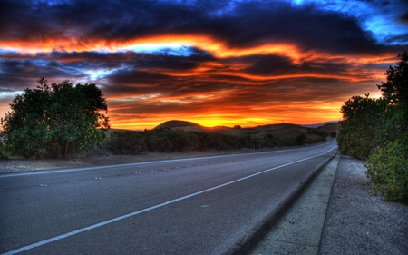 Orange in the Sky - sky, trees, yellow, clouds, sun, orange, road, setting