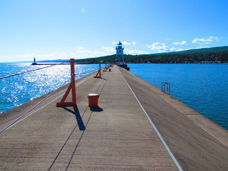 Lighthouse on the breakwall - water, lighthouse, harbor, light, pier, breakwall