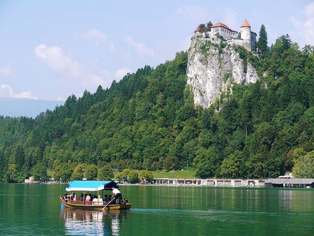 House on Rock - picture, slovenia, lake, trees, cool, house, boat, big rock