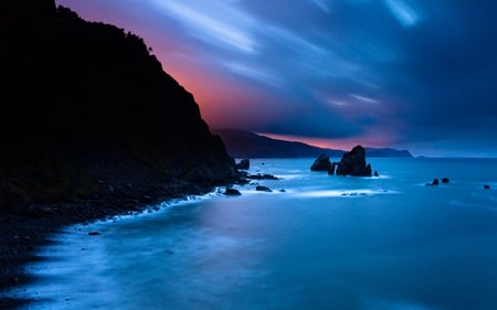 Blue Sea - beauty, beach, sky, peaceful, blue sky, sunset, rocks, amazing, view, clouds, ocean, blue sea, lovely, waves, nature, blue, beautiful, splendor, stones, colors, sea