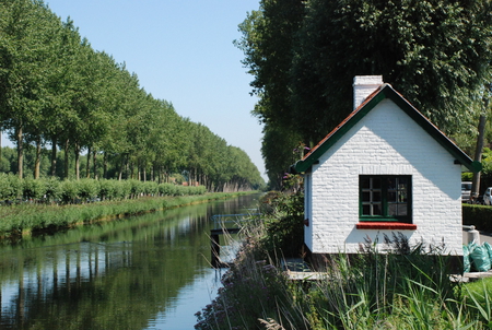 The old customs house on the canal. - trees, water, tollbooth, beautiful, old, canal