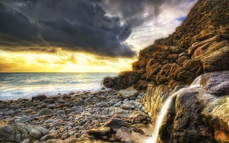 Lovely View - beach, splendor, sunrise, view, cliff, sky, clouds, sunlight, beautiful, sea, beauty, colors, lovely, ocean, stones, fall, colorful, nature, waterfall, sunset, rays, waves, peaceful, rocks