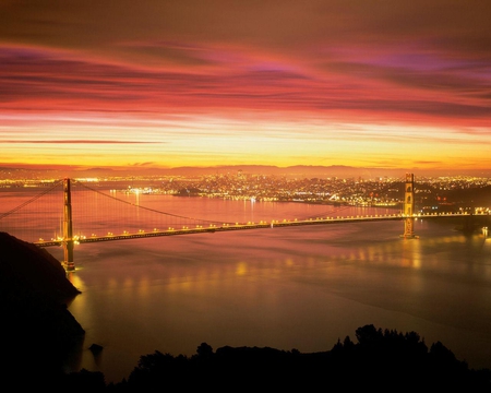 Golden Gate Bridge - water, yellow, bridge, sun, lake, sky, architecture, clouds, city, nature, sunrise