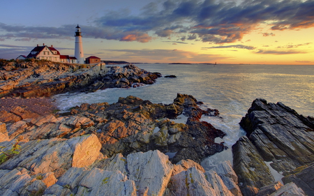 The lighthouse - water, lighthouse, rocks, sky