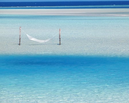 Hammock Hanging in Shallow Water - white, water, blue, beach, hammock, ocean, sand, sky