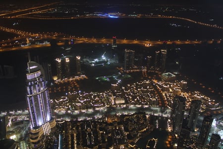 The city of Dubai by night - black, white, dubai, photography, skyscrapers, night, light