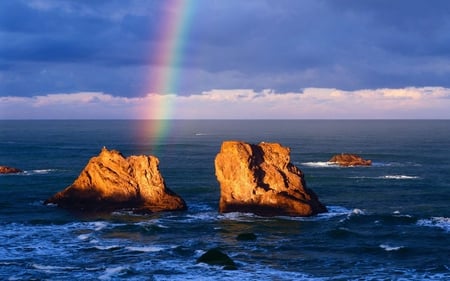 Rainbow over the sea - sea, rainbow, nature, rocks